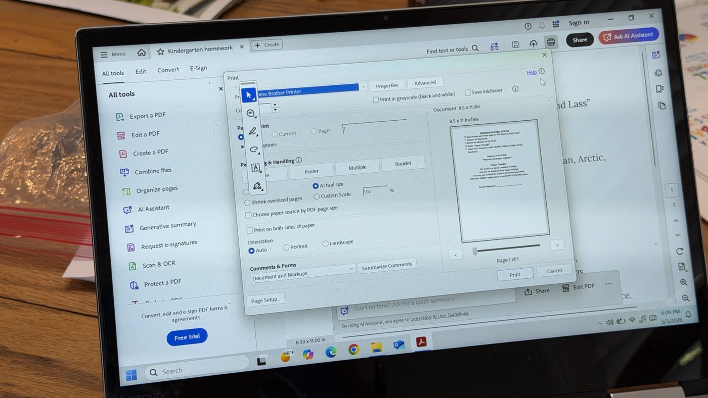 Laptop showing print setup for a Brother printer